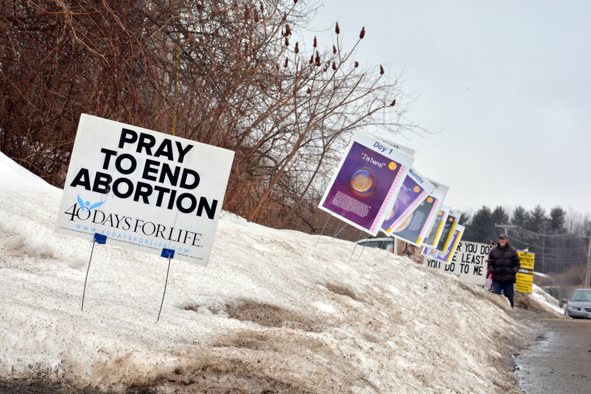 Abortion protest signs