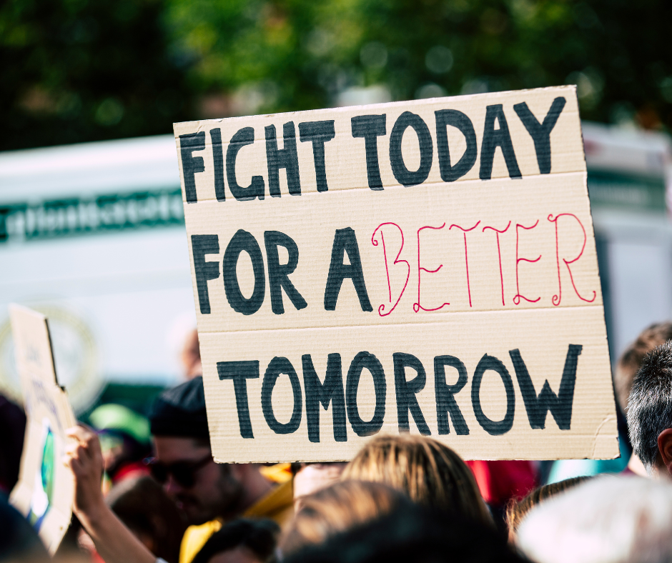 Stock image of a protest sign that says "Fight today for a better tomorrow."